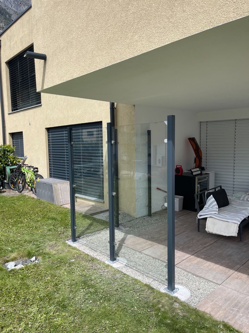 Pare-vent verre sur terrasse